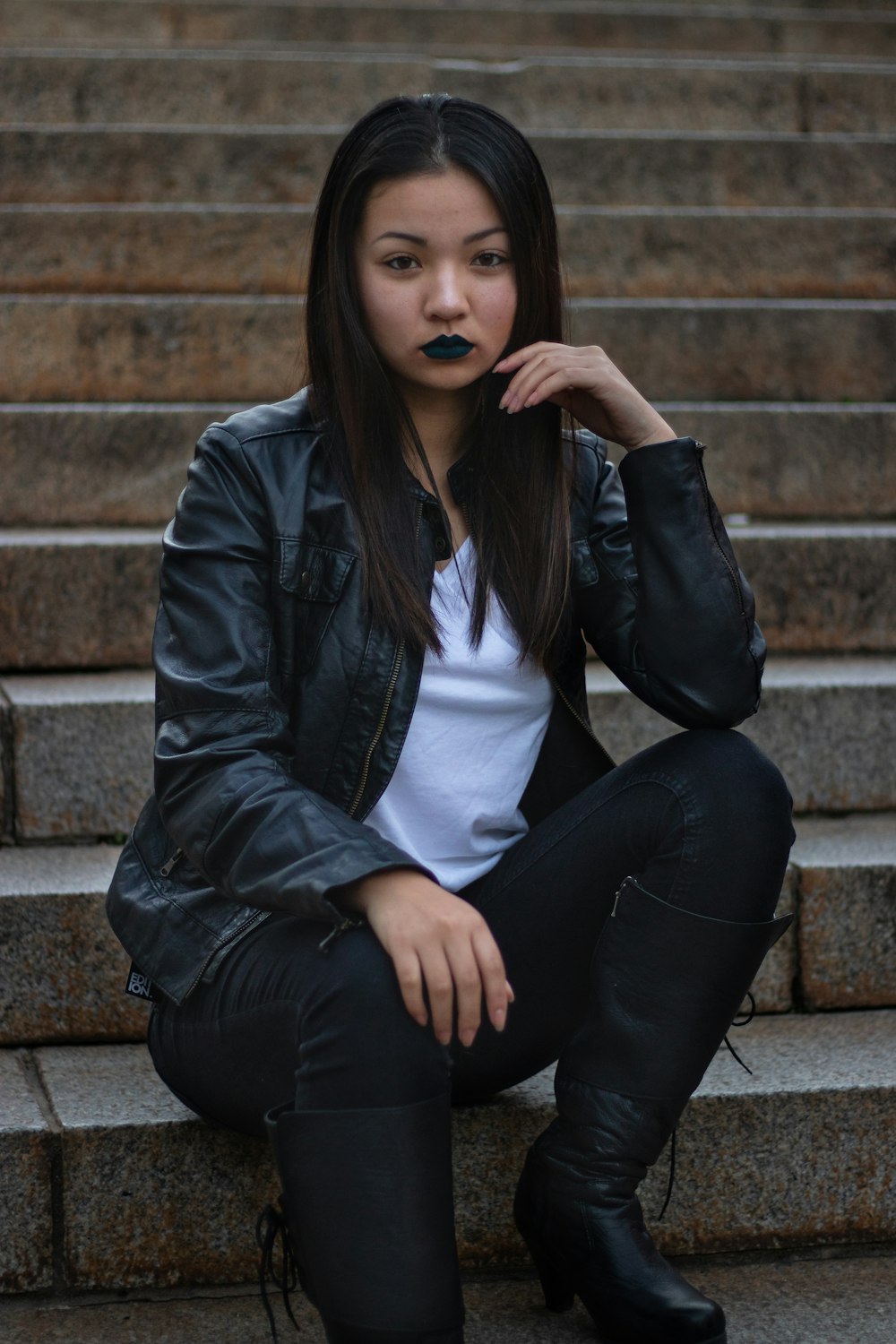 women's white shirt and black leather jacket