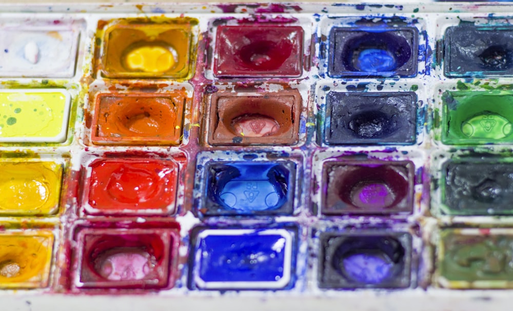 assorted-colored paints