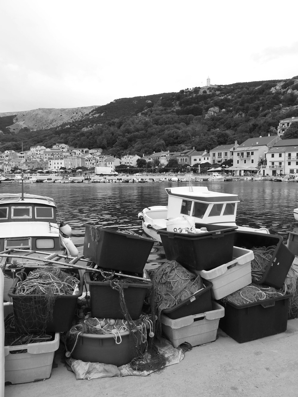 gray-scale photo of motorboats