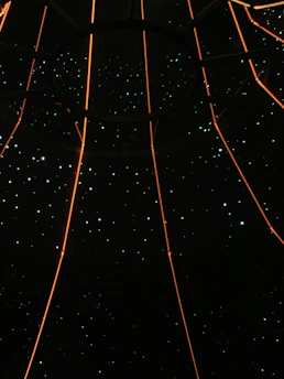 A glowing cosmic network of stars representing interconnected workflows in a galaxy.