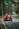 man and woman near orange car