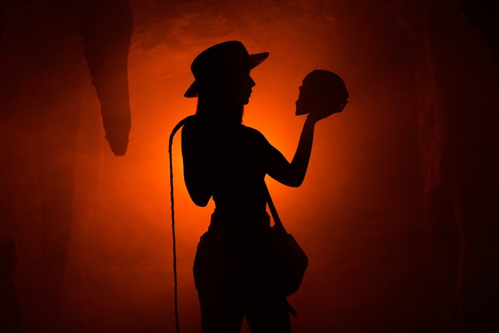 silhouette photo of cowgirl