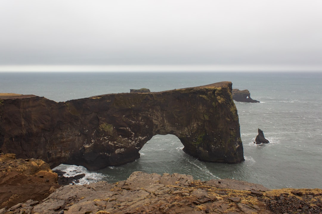 travelers stories about Natural arch in Dyrhólaey Lighthouse, Iceland
