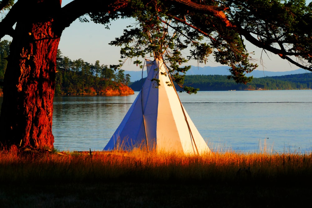 tent near body of water