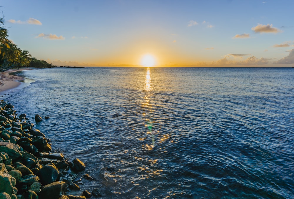 calm body of water during daytime