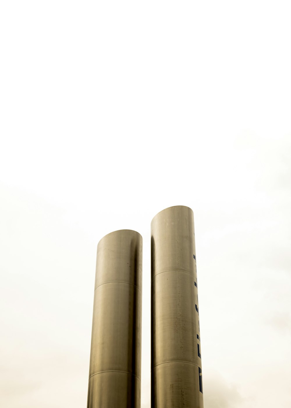 a couple of large metal cylinders sitting next to each other