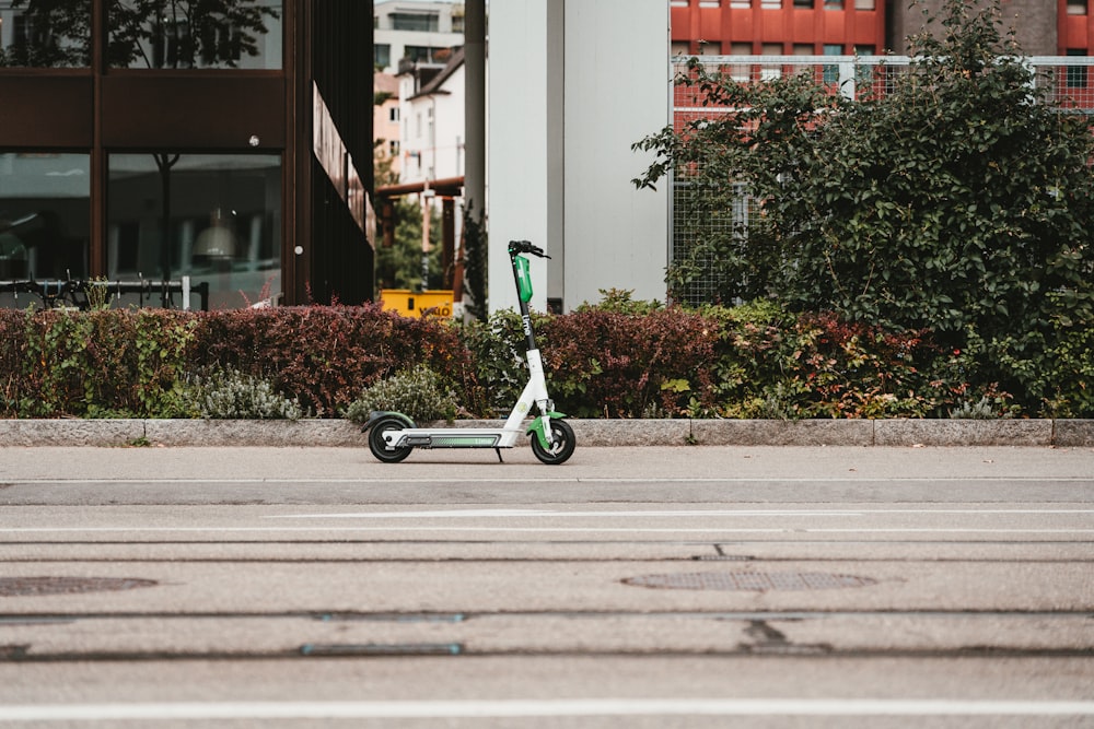 white and green kick scooter