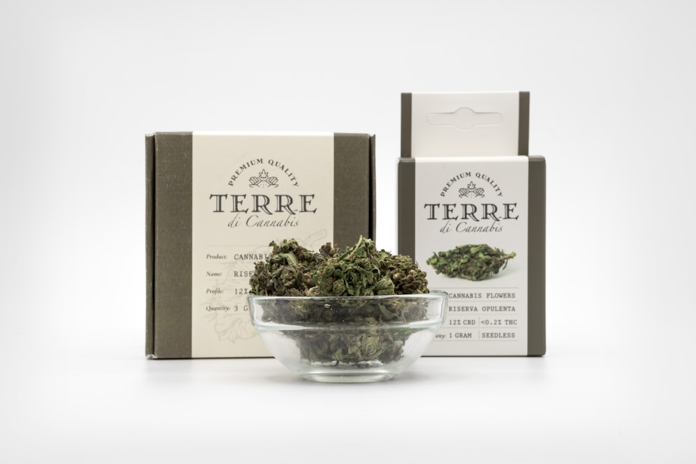 Terre cannabis in bowl by boxes
