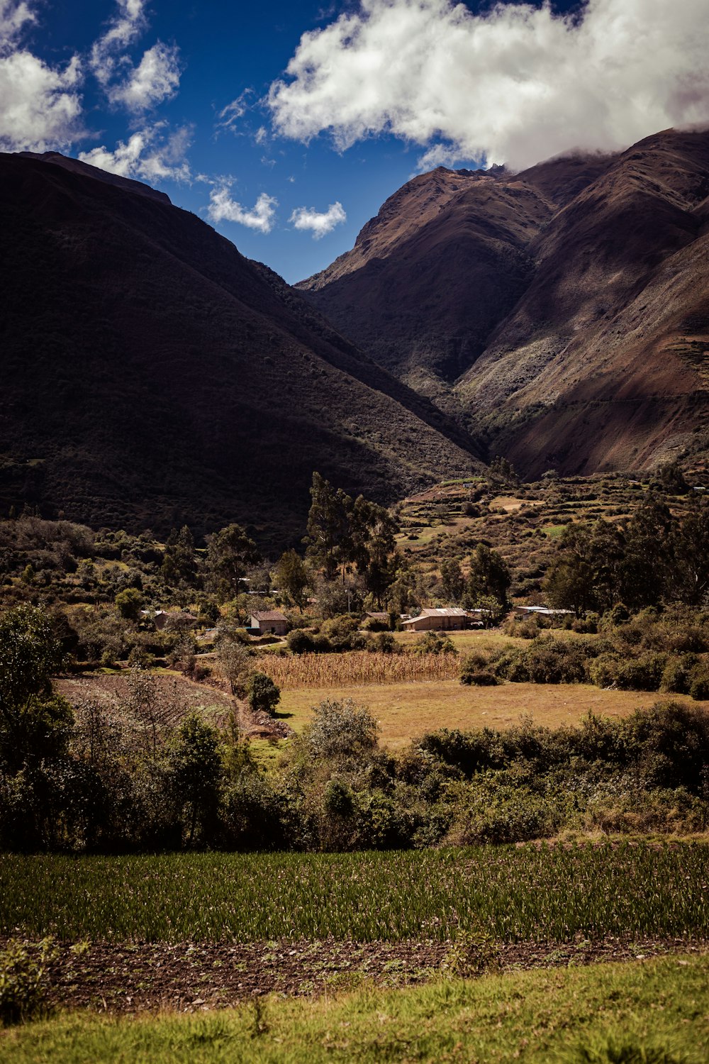 houses between mountain foot