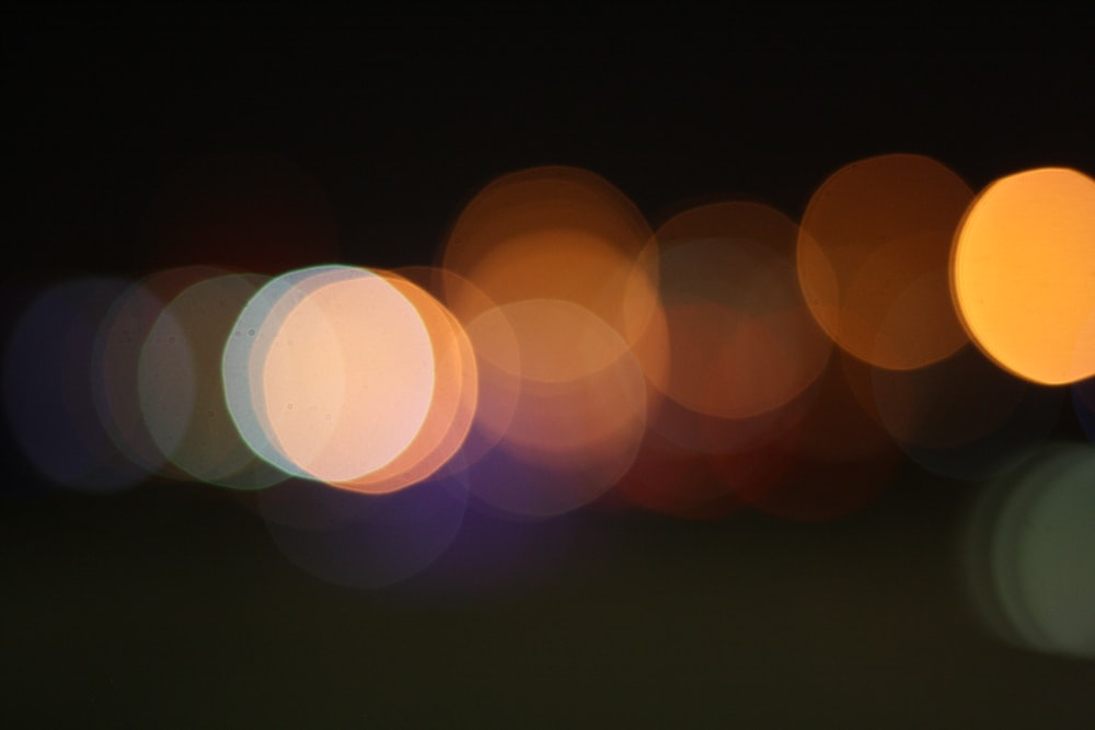 a blurry photo of a city street at night