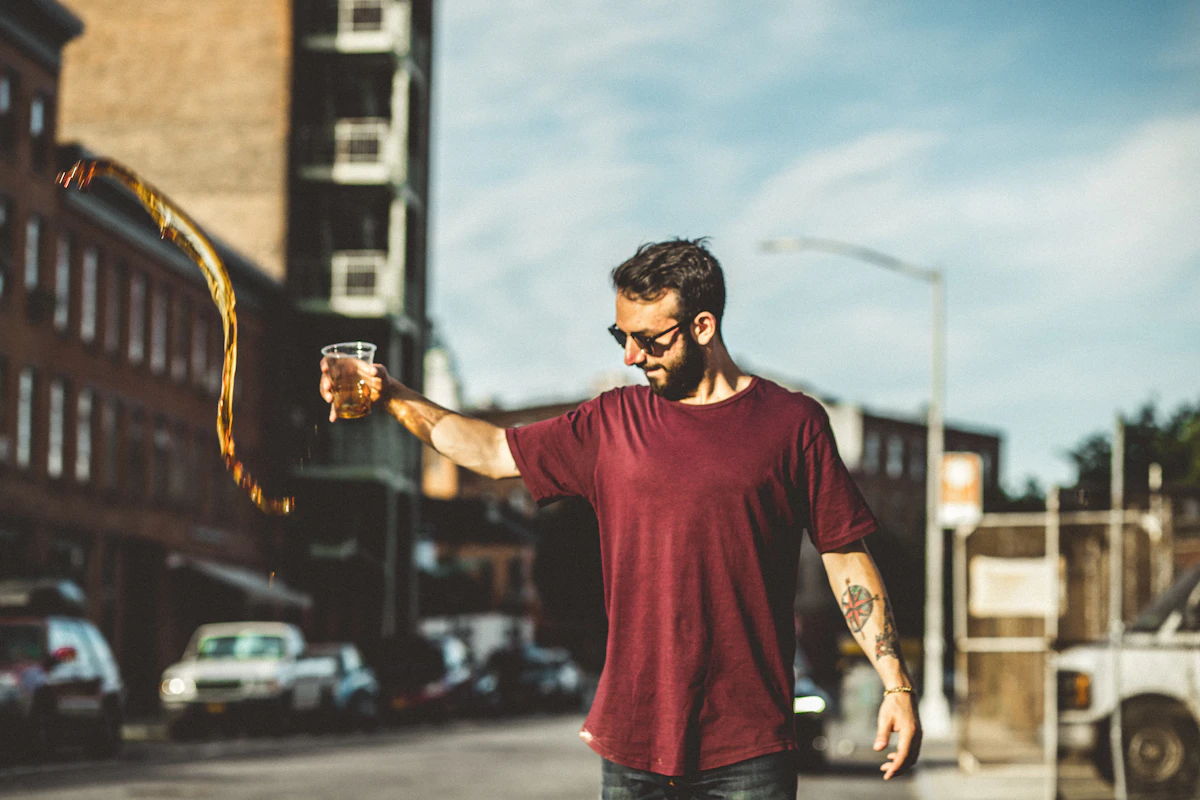 Middle-aged man standing outdoors looking thoughtful, illustrating how low testosterone and type 2 diabetes are linked in men.