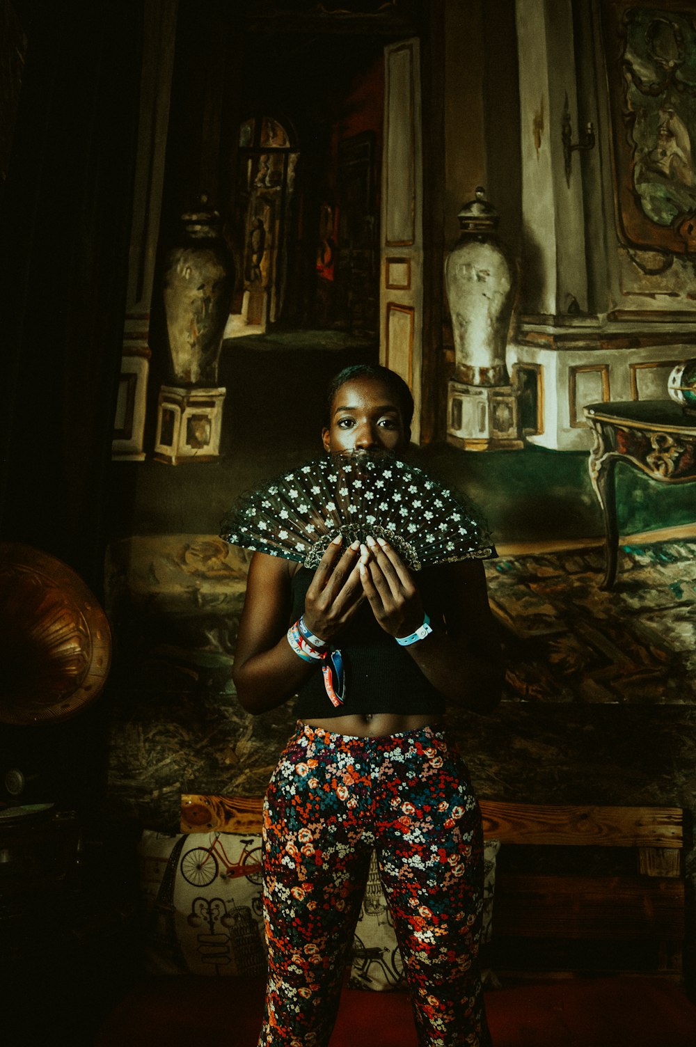 woman holding fan