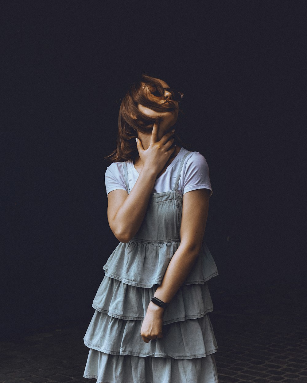 woman in blue dress on focus photography