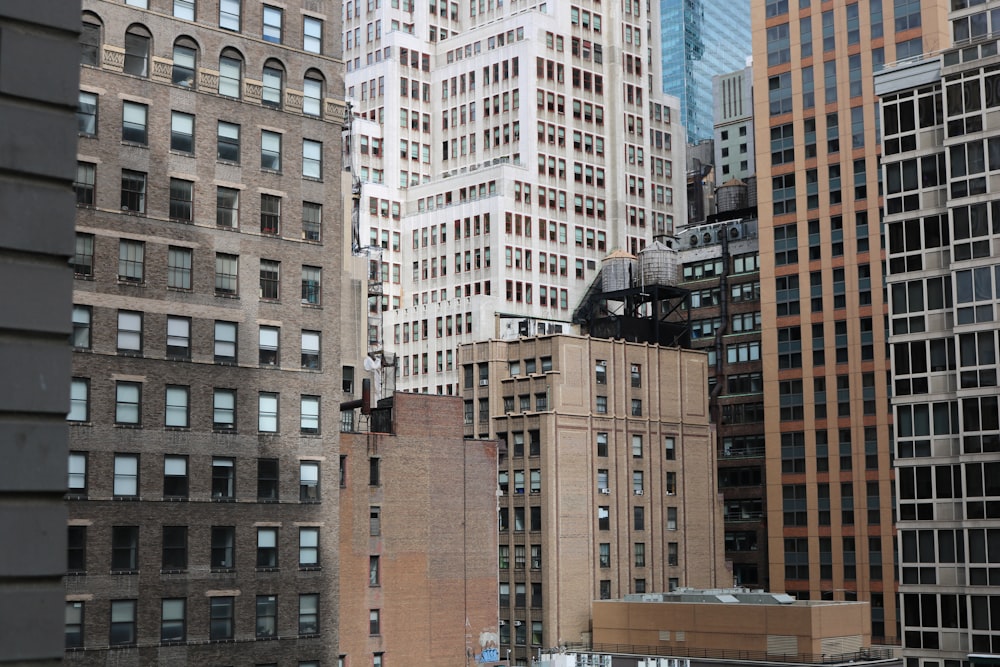 white and brown high-rise buildings