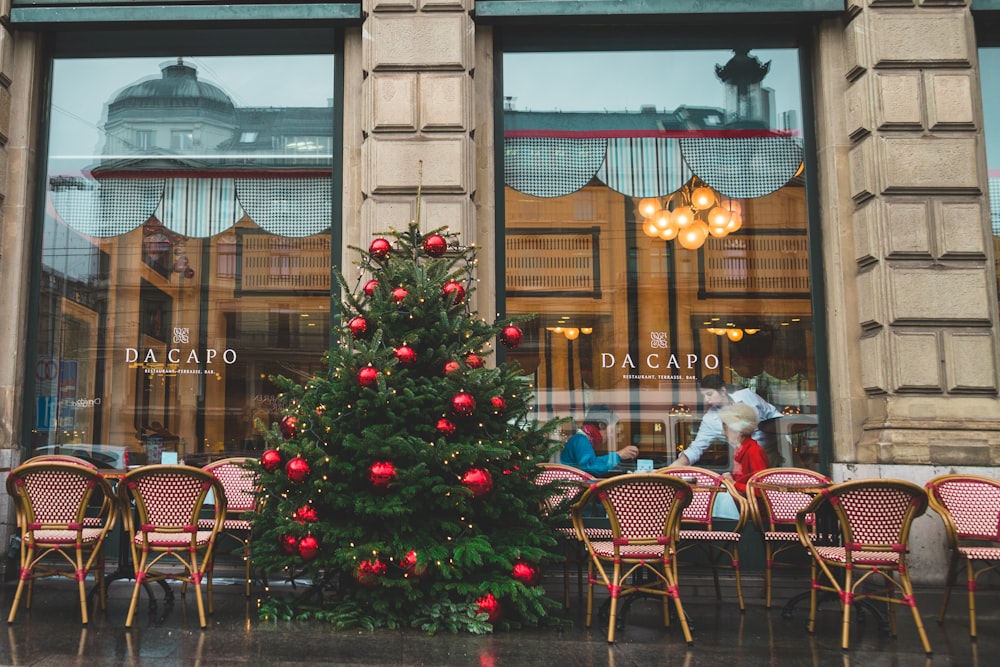 green Christmas Tree with red Christmas baubles