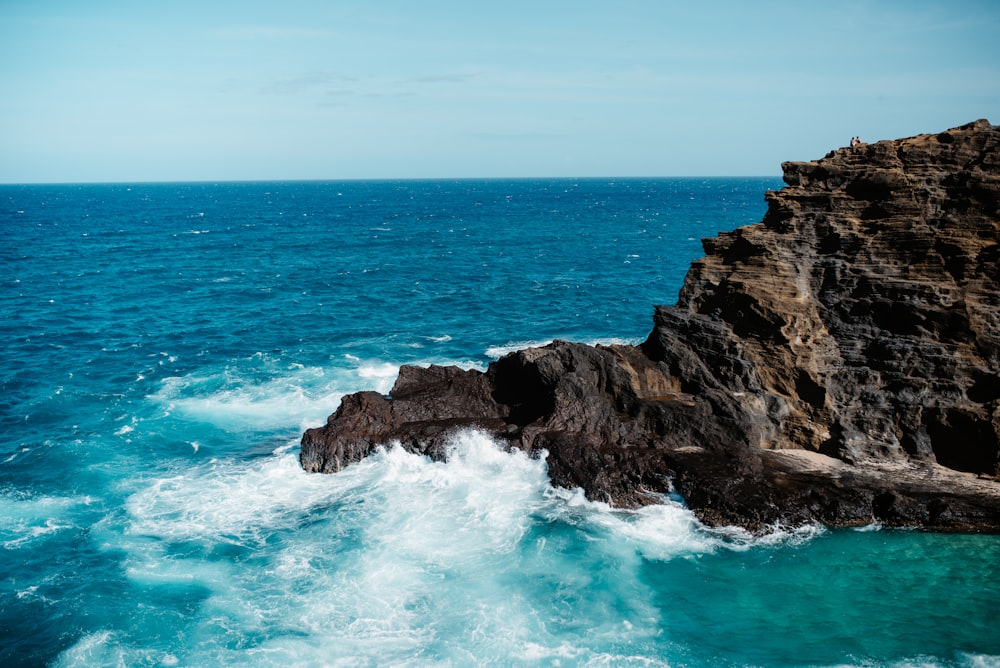 blue water and gray rock