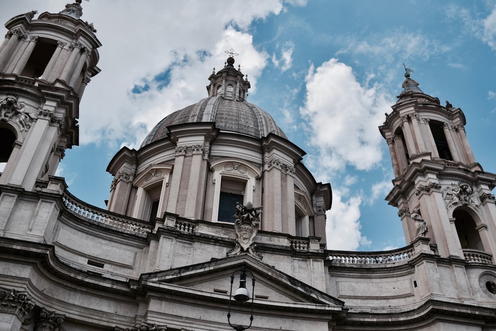 gray concrete dome building with towers during daytime