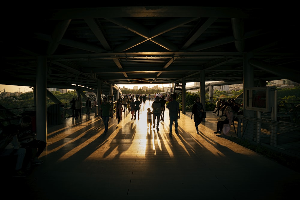 silhouette photography unknown persons walking