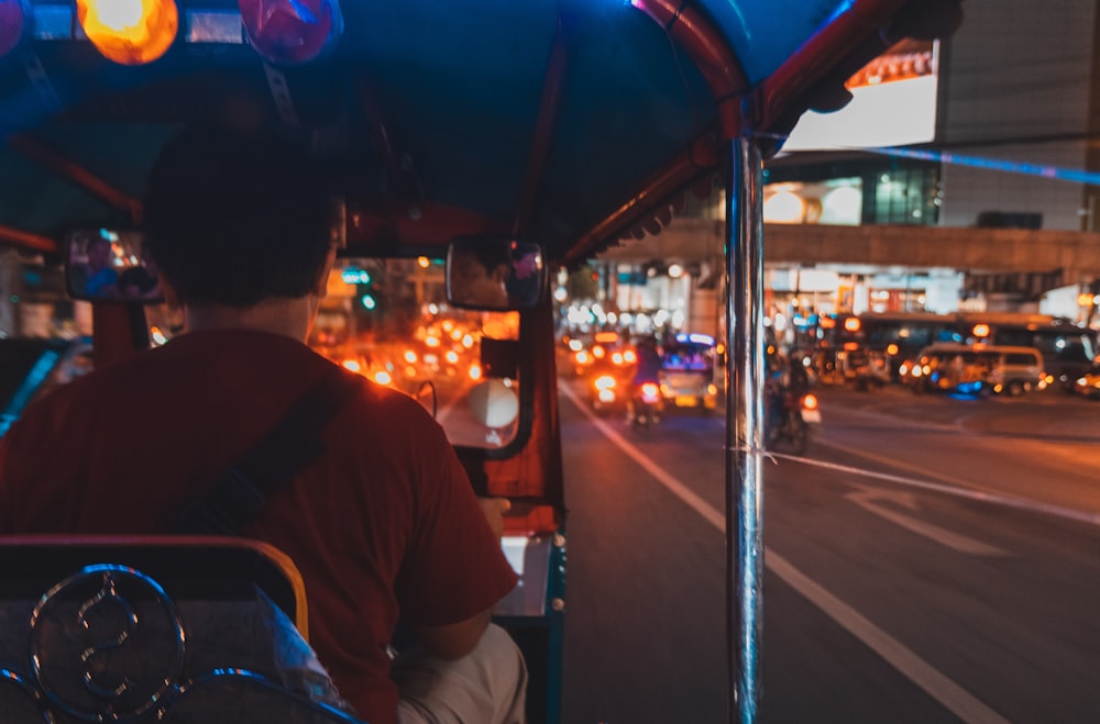 driver drives autorickshaw during nighttime