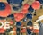 A ceiling adorned with large, colorful balloons in shades of red and black. Neon lights cast a warm glow, reflecting on glossy surfaces and creating a playful, modern atmosphere.
