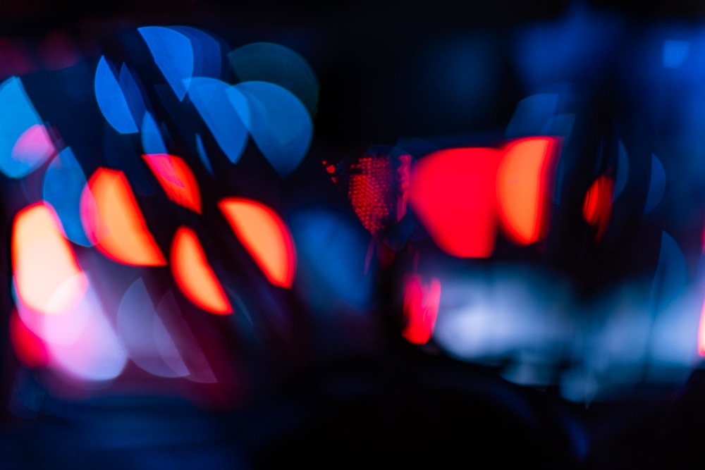 a blurry photo of a city street at night