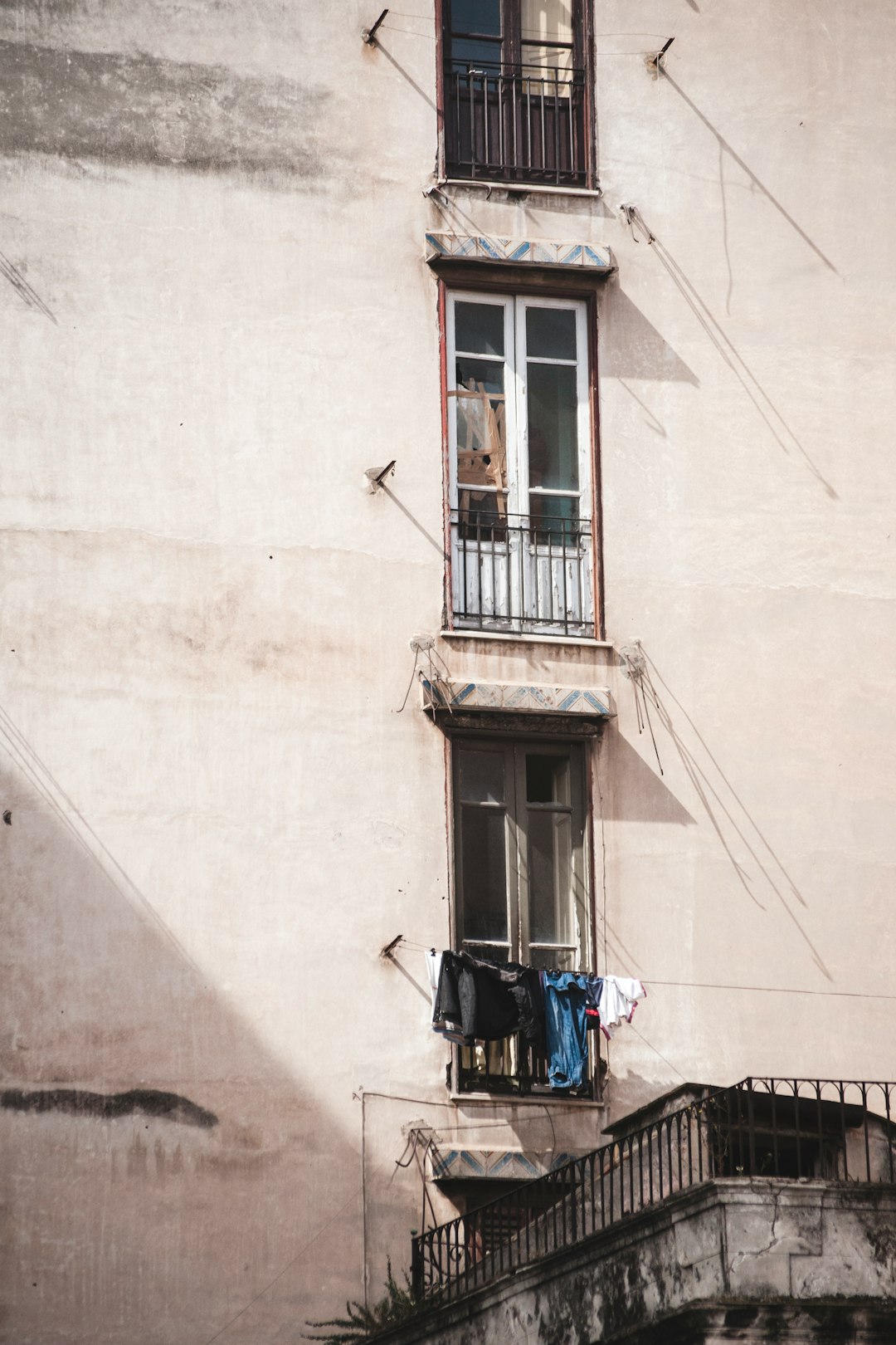 clothes hanging near at apartment window