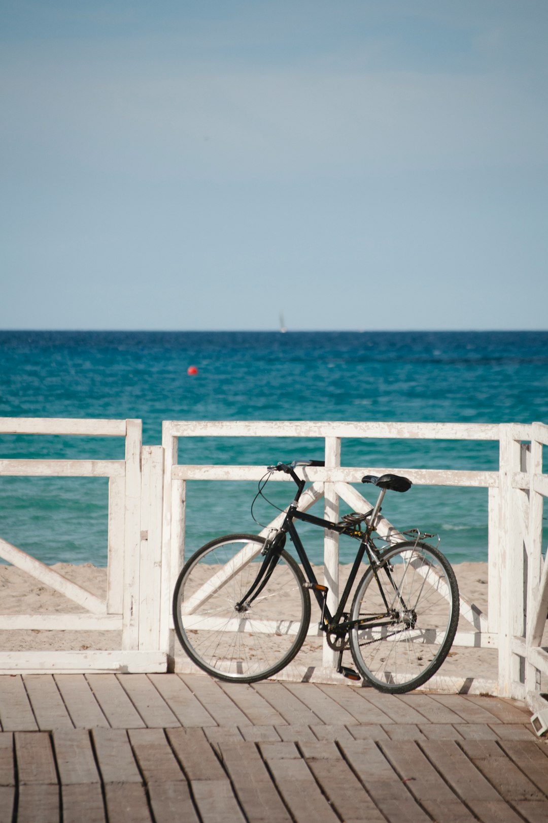 bike on dock near sea
