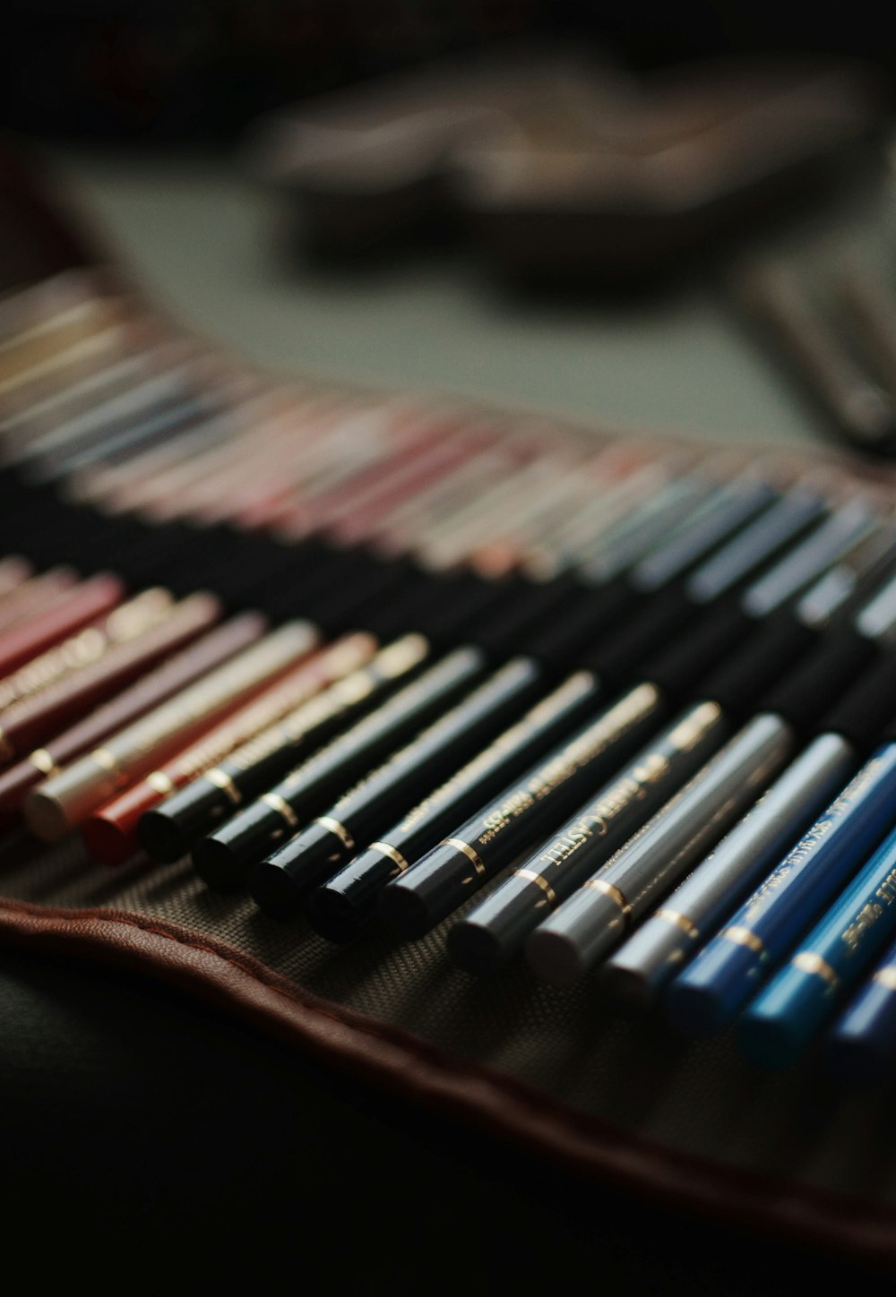 assorted-color pens collection on table