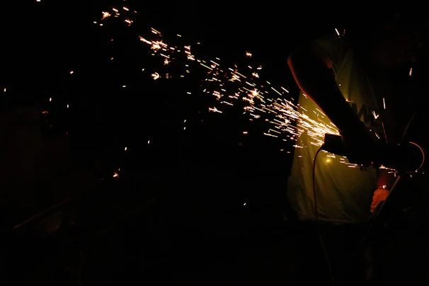 Close-up photo of power tools in action with sparks flying