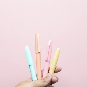 four assorted-color pens