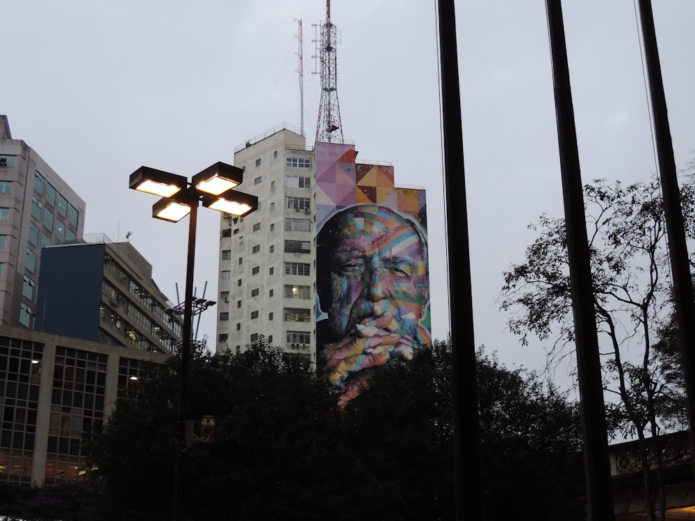 white building with man's portrait