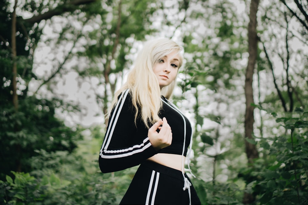 woman in white and black jacket standing outdoors