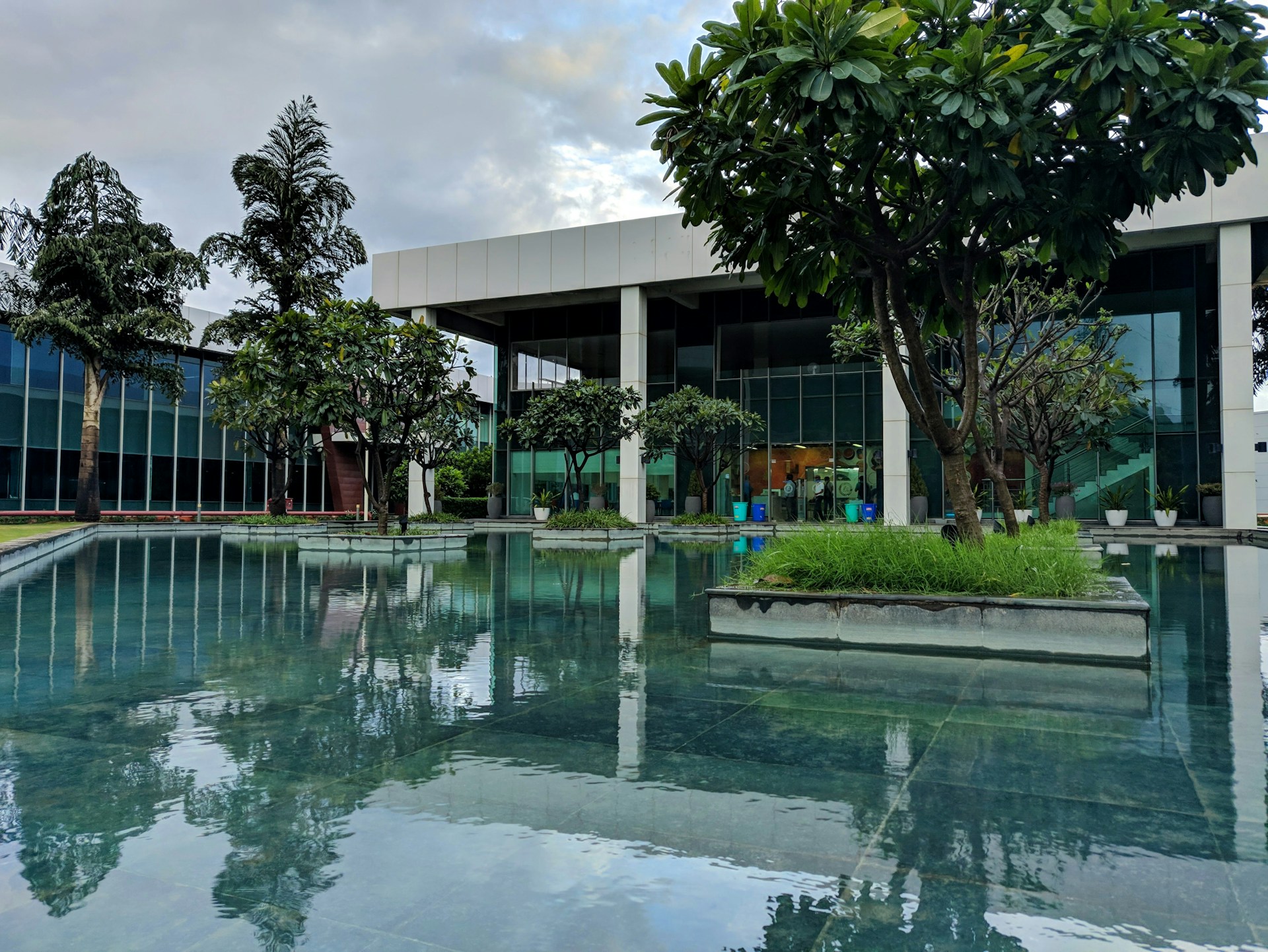 woman wearing yellow long-sleeved dress under white clouds and blue sky during daytime