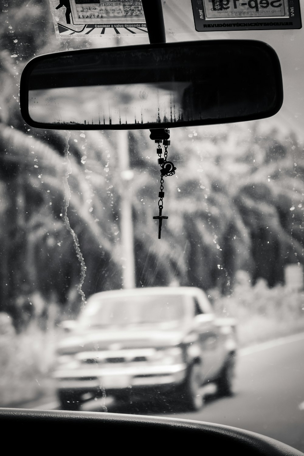 grayscale photo of rear view mirror
