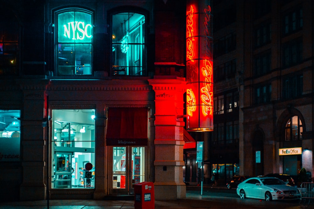 powered-on neon signboard on building