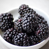 black berry fruit on bowl