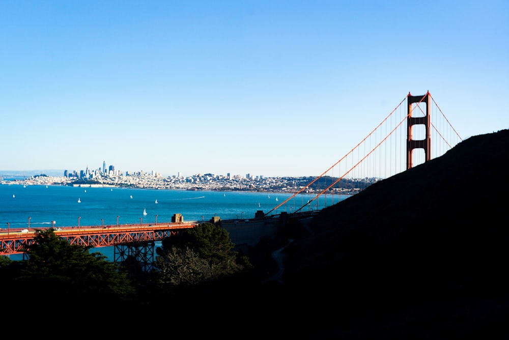 red bridge over ocean