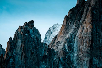 The rugged volcanic peaks of the Tibesti mountains with Emi Koussi rising prominently.