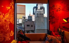 Window view from the room showing the vibrant streets near Dashashwamedh Ghat.