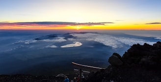 Sunrise view over Mount Bromo with vibrant orange sky