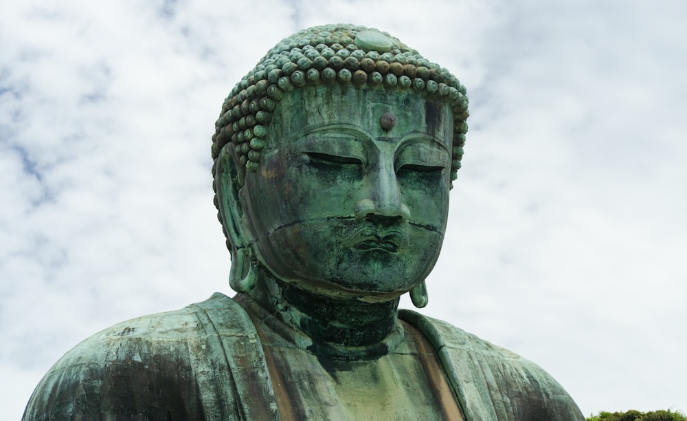 gray concrete Buddha statue close-up photography