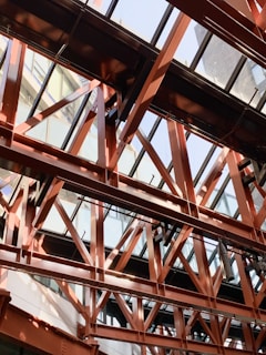 Structural steel beams forming the robust framework of a contemporary office building.