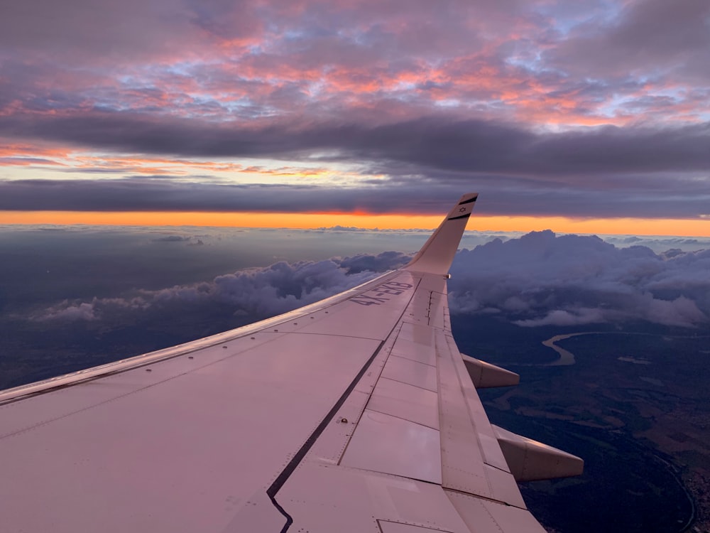 architectural photography of beige aircraft wing