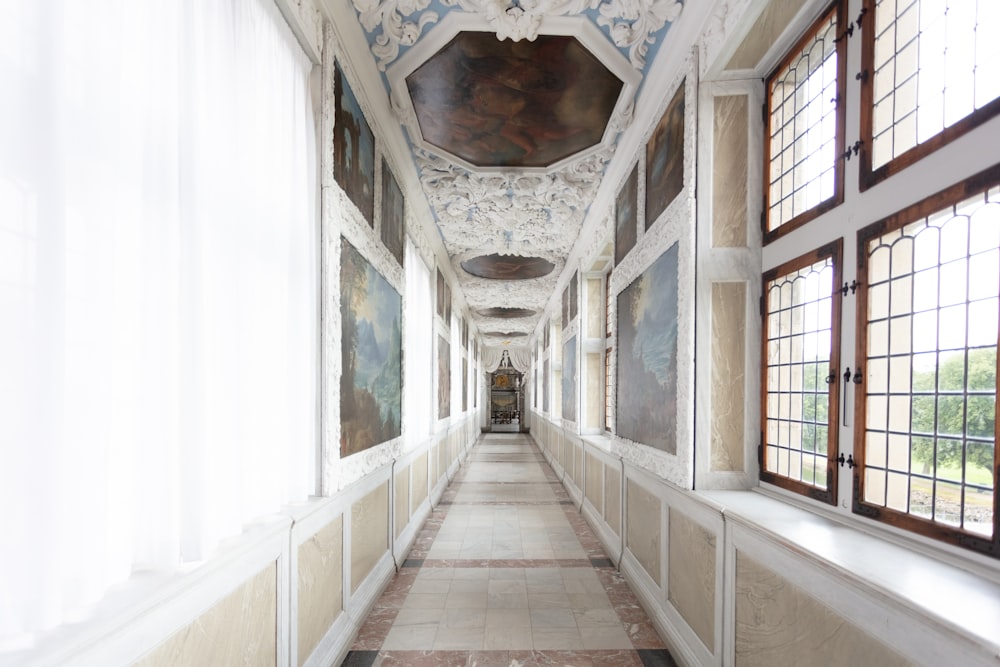 empty white and brown concrete hallway