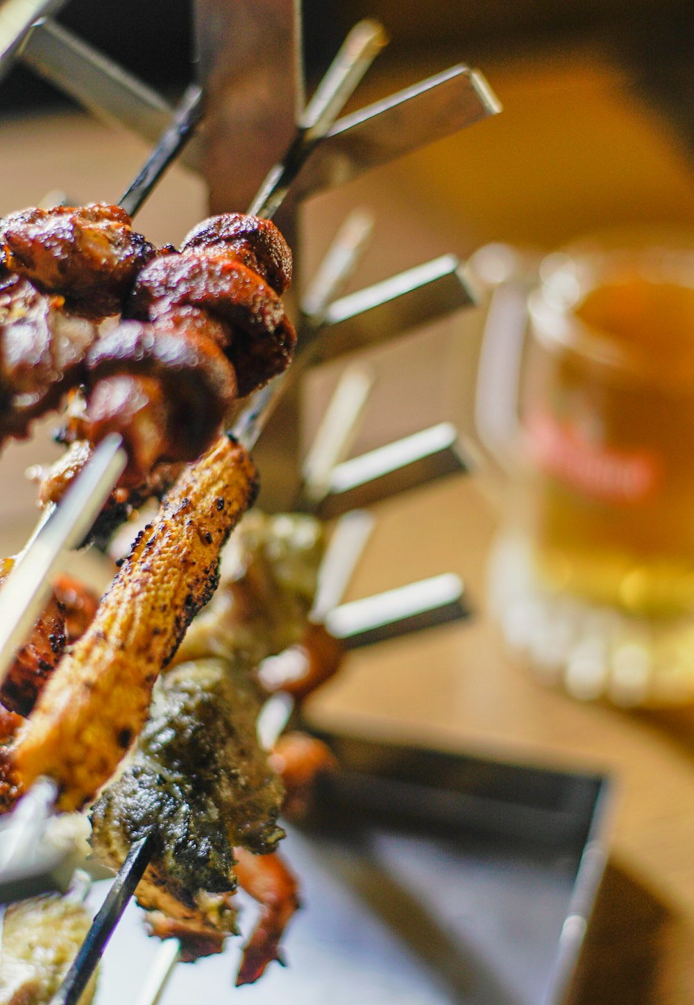 selective focus photography of skewered meat