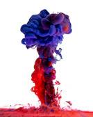 Magenta ink droplets mixing with yellow, creating dynamic color gradients.