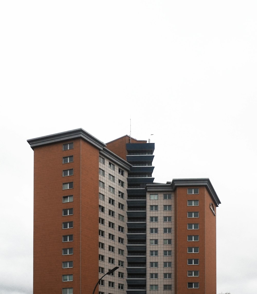 orange and white high-rise building