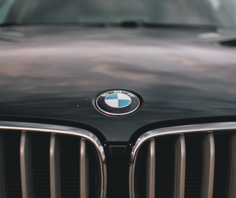 shallow focus photography of black BMW car