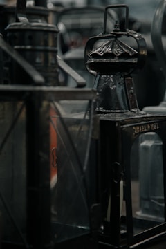 A collection of antique wall lights arranged in a cozy living room setting.