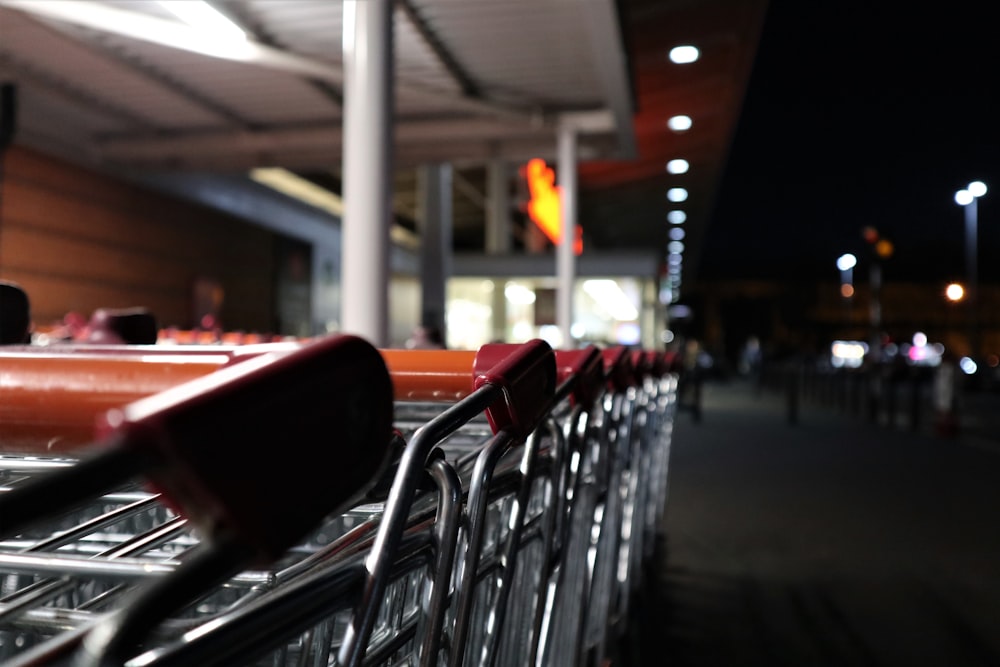 shopping carts beside wall